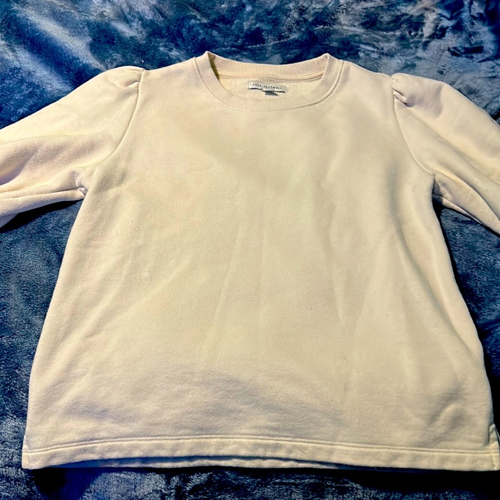Shirt that is cream color size is small